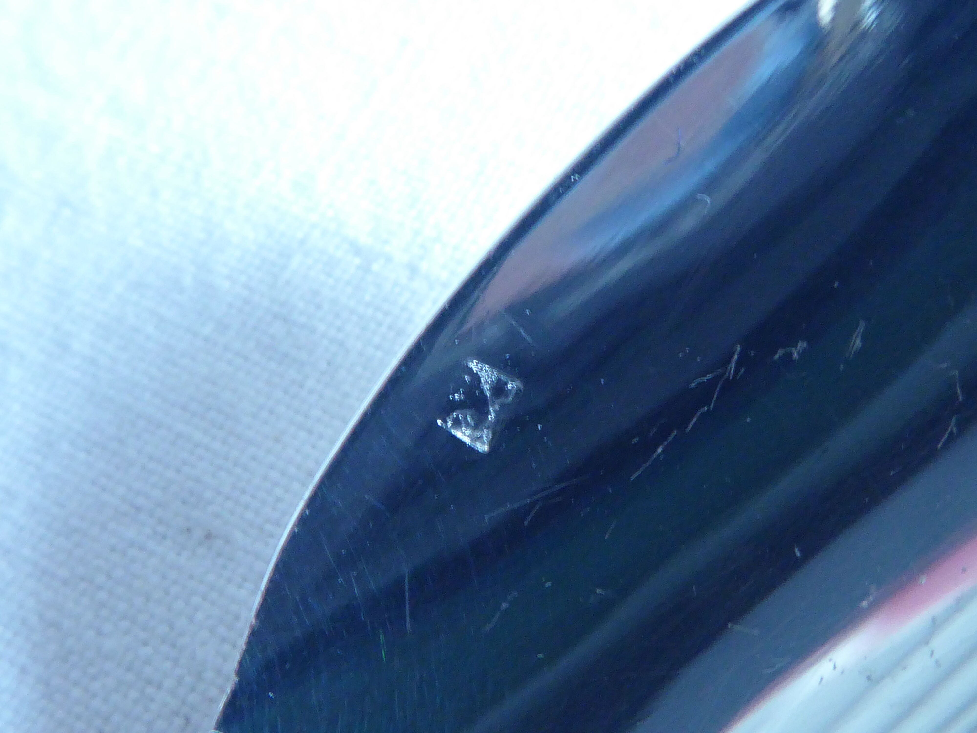 Cockerel + silver metal spoon