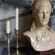 Bust of a woman "the elegant"XIXth in painted plaster signed on its solid wood base