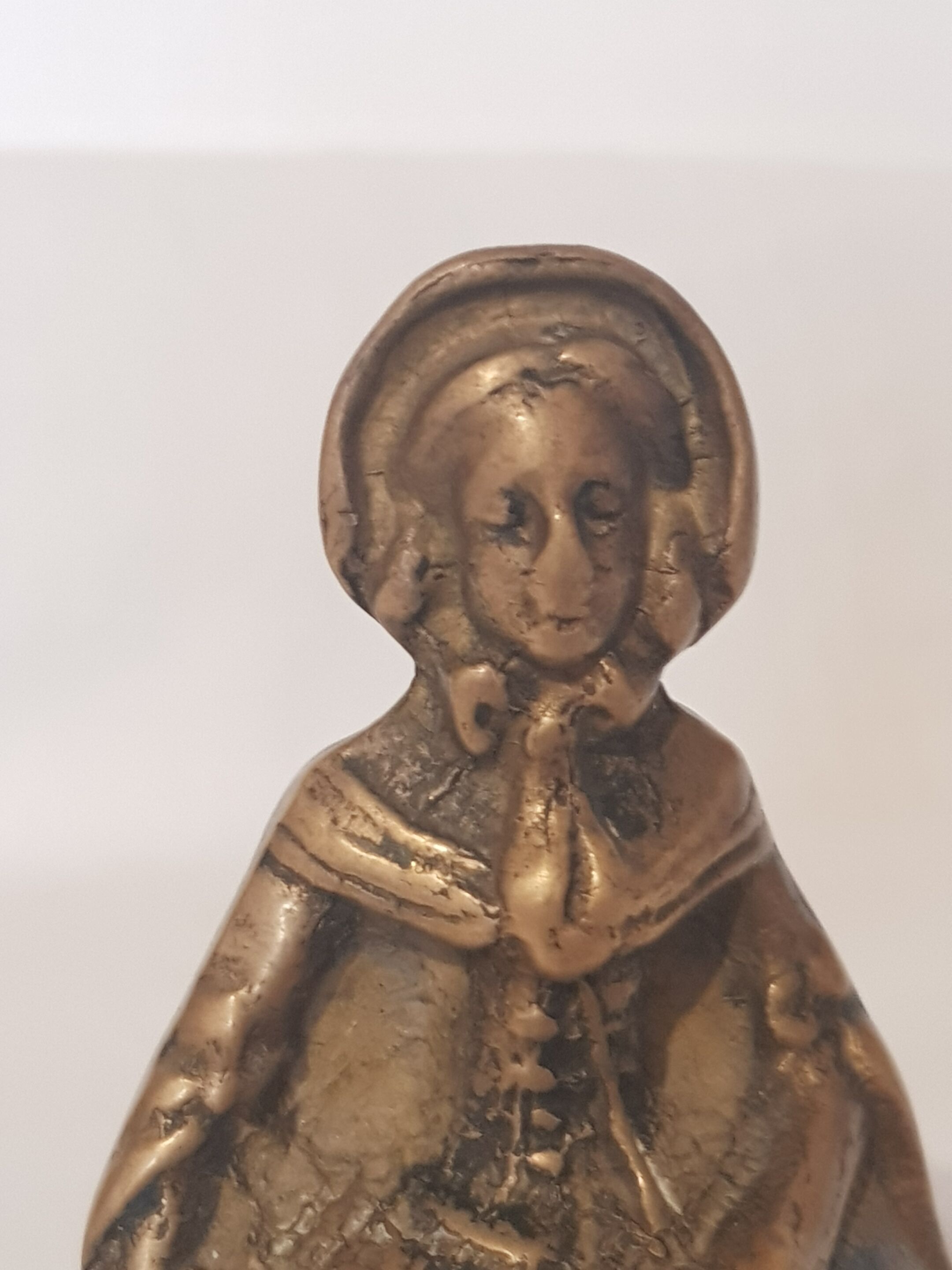 Women's bronze table bell