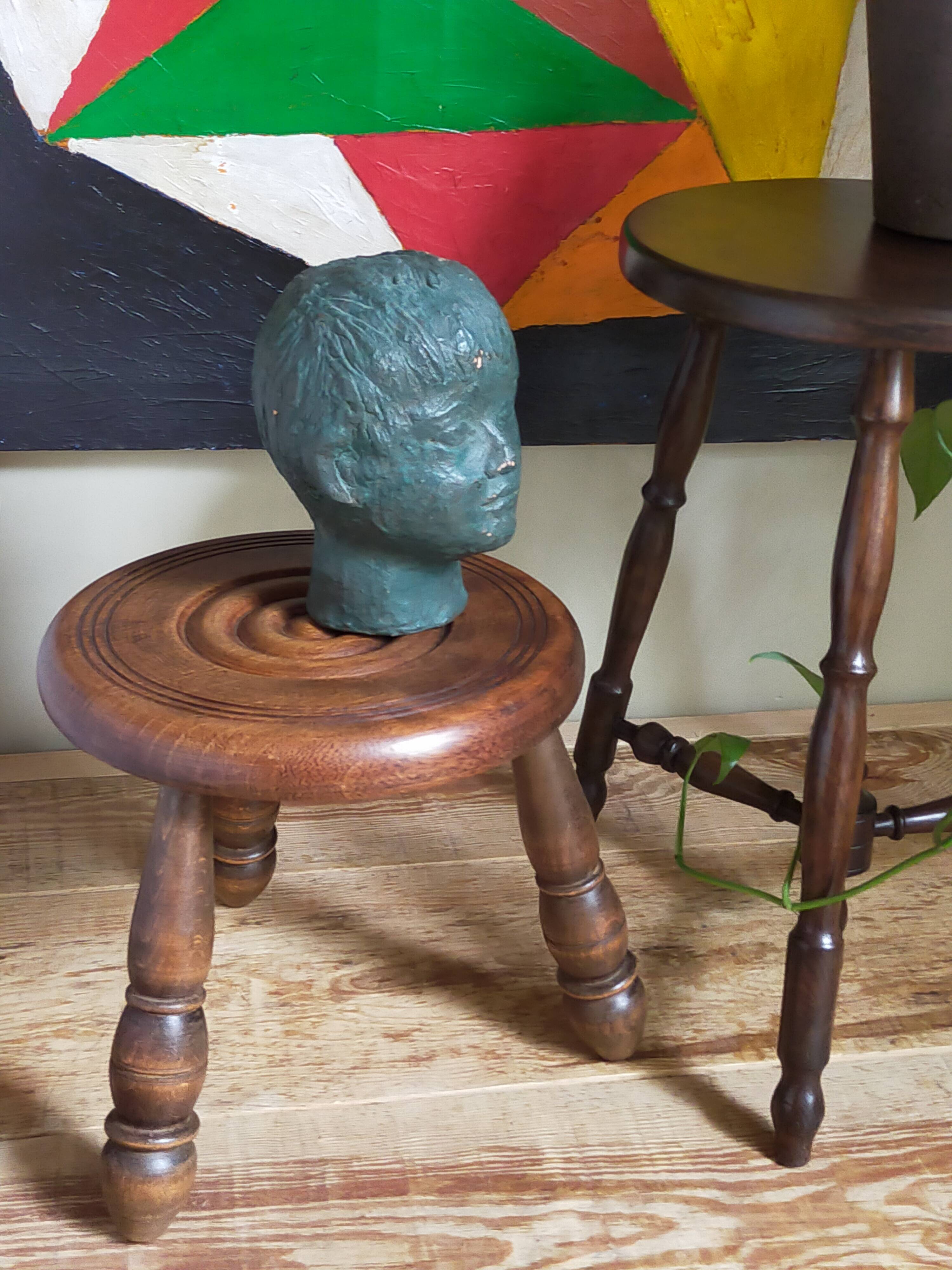 Low tripod stool in vintage turned solid wood