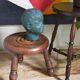 Low tripod stool in vintage turned solid wood