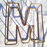 letter M in gilded metal or W in the other direction
