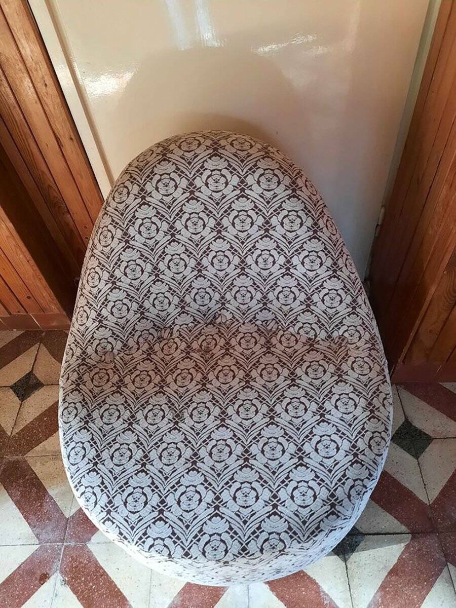 1970s vintage armchair in multicoloured patterned fabric, rounded silhouette