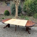 Large oval mahogany dining table from the 19th century Restoration period