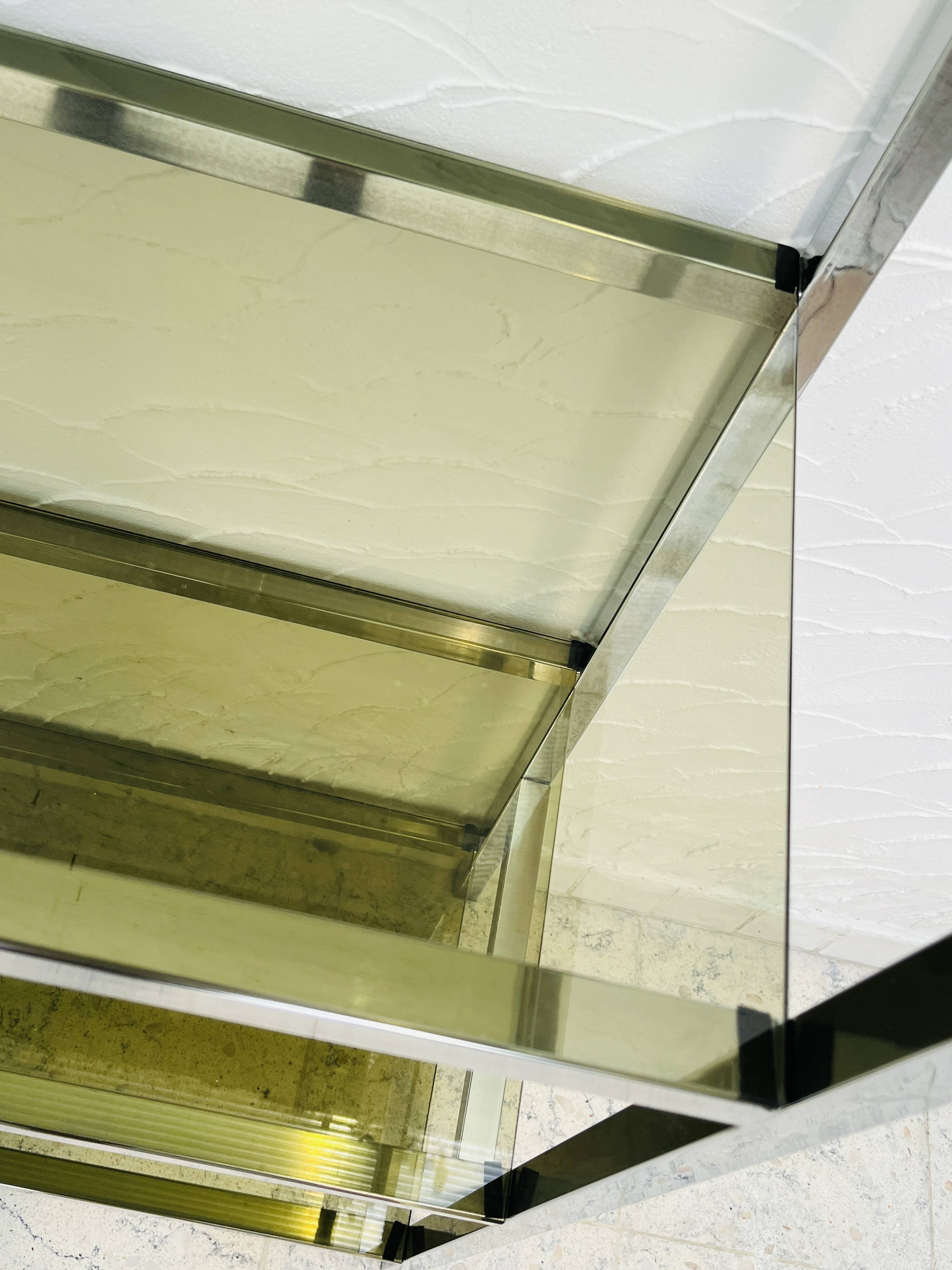 Chrome and smoked glass shelf in Italian 1970s style.