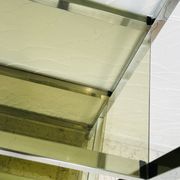 Chrome and smoked glass shelf in Italian 1970s style.