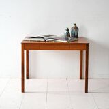 Vintage Scandinavian teak coffee table with carved edge