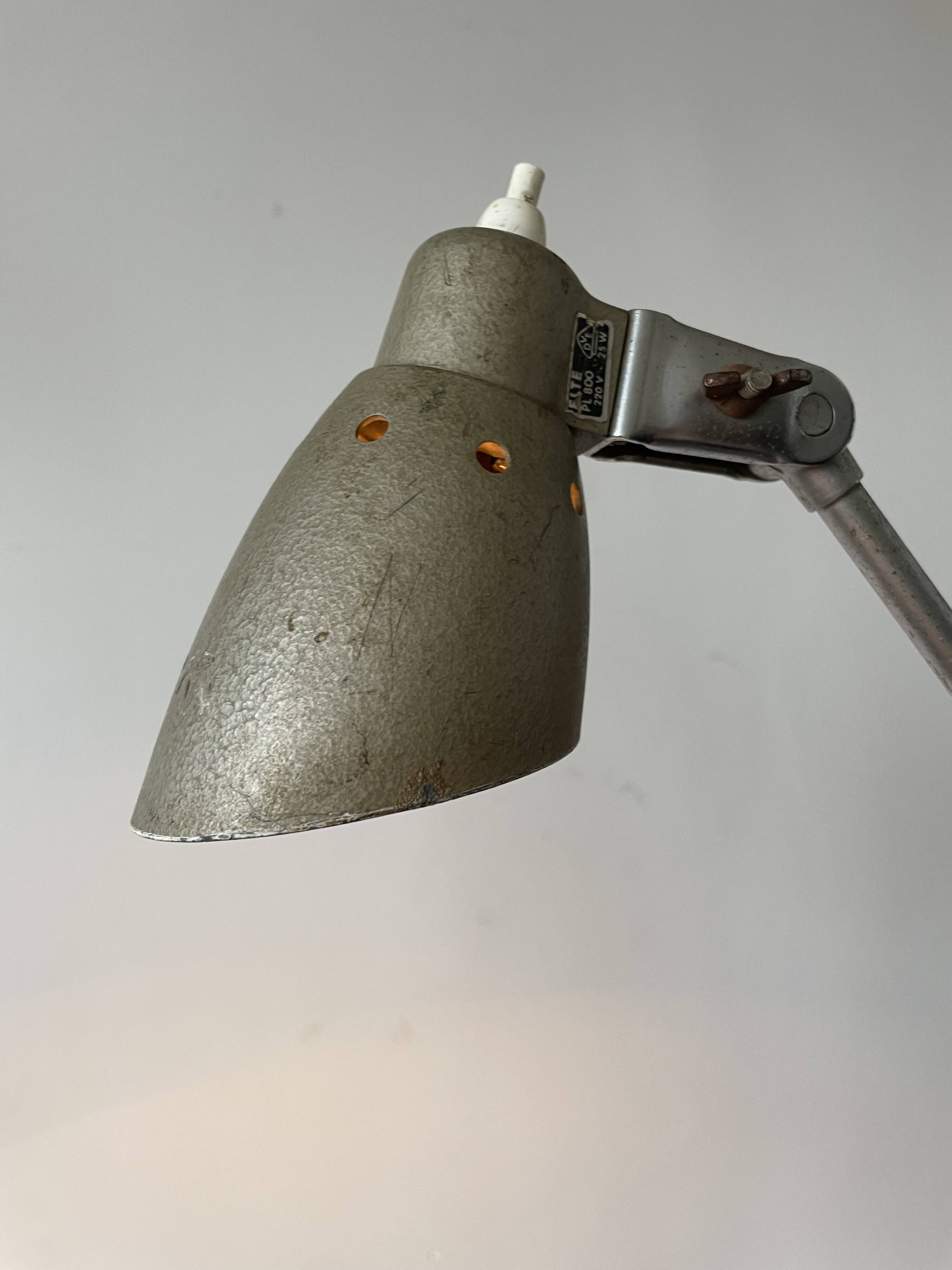 Old industrial articulated lamp