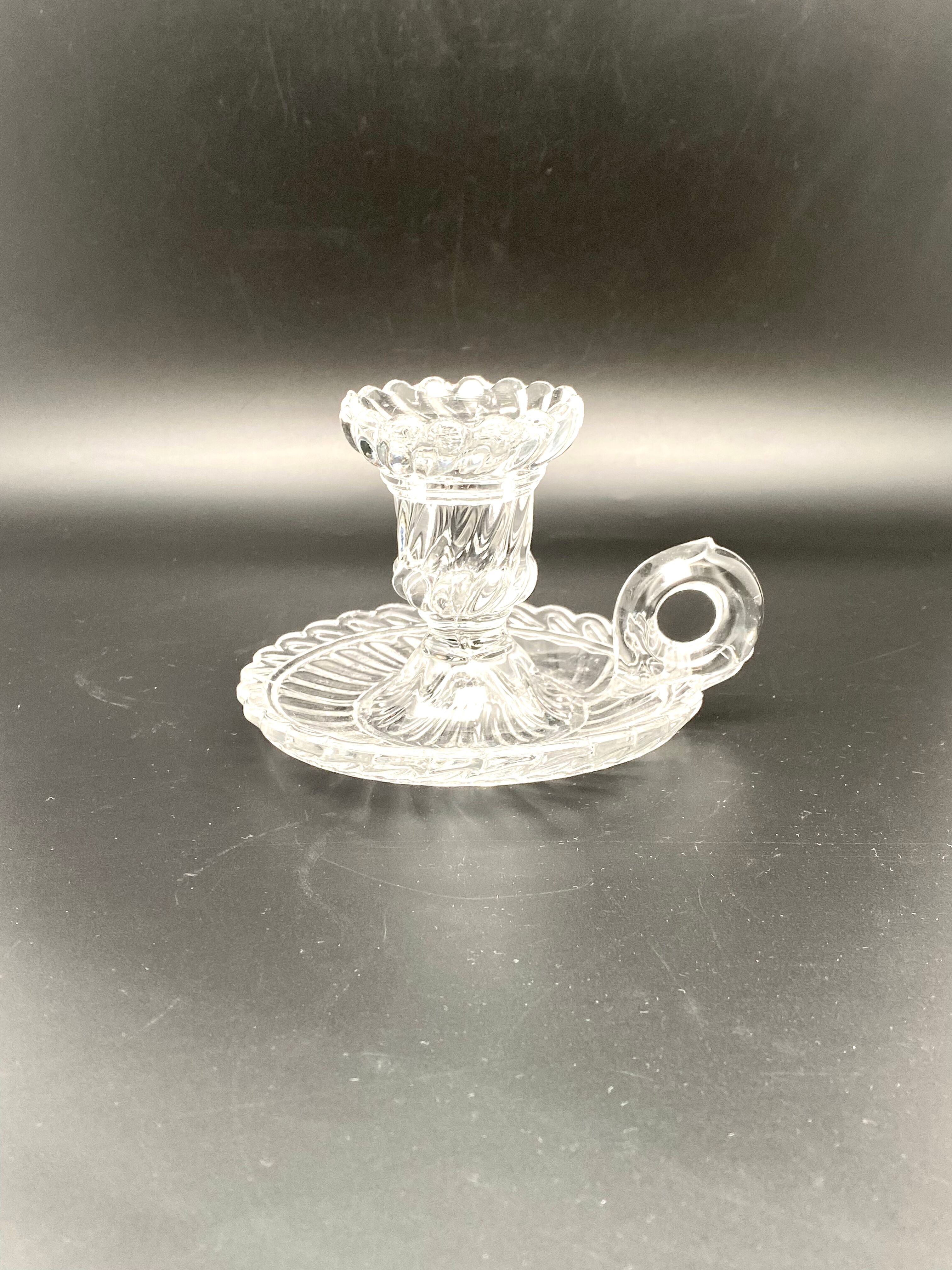 Candle holder with cup and handle in worked glass