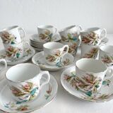 12 ironstone coffee cups with polychrome floral decoration, KG Lunéville