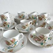 12 ironstone coffee cups with polychrome floral decoration, KG Lunéville