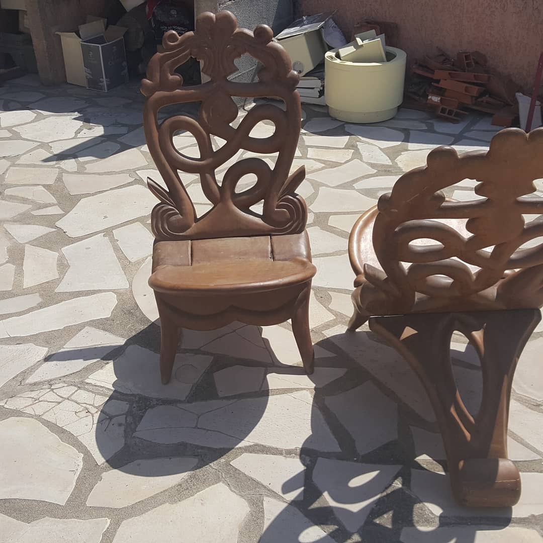 Pair of solid mahogany armchairs from Madagascar, circa 1950
