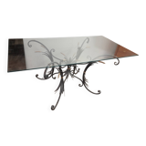 Glass top table with iron base in the style of wheat ears. Attributed to Robert Goossens.