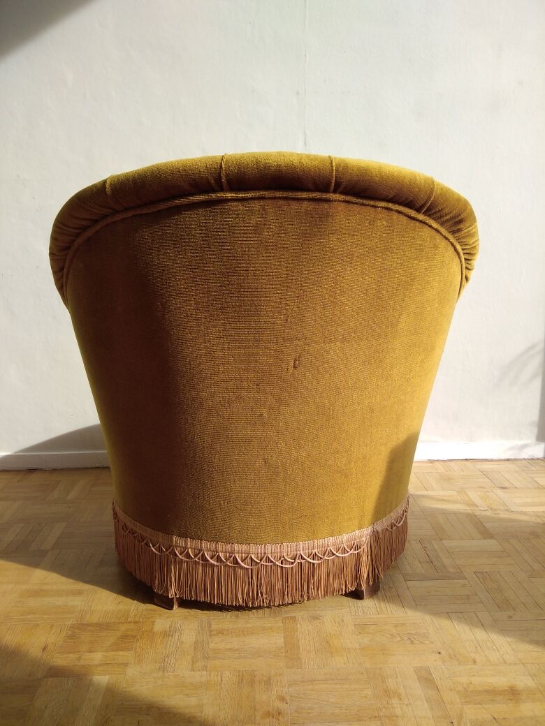 Fauteuil crapaud en velours doré