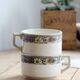 Ivory iron earth chocolate cup - Polychrome frieze decoration