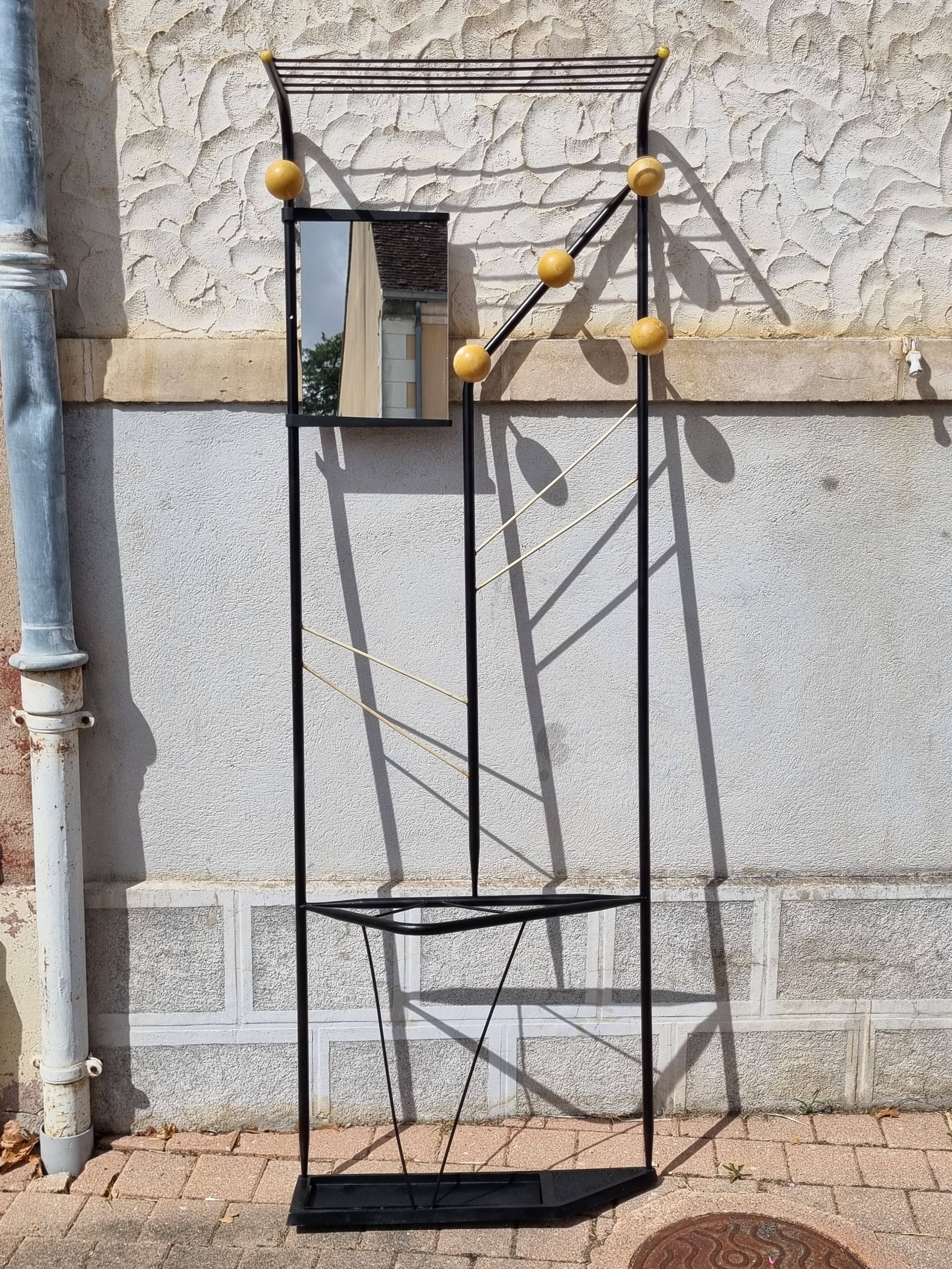 Postmodern entrance wardrobe from the 1980s in black metal and Bakelite, 180 cm.