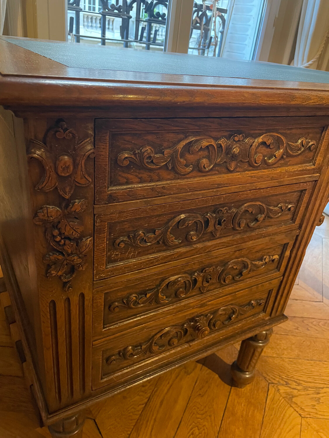 Solid wood desk and green leather writing pad
