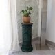Pedestal column in green ceramic with flower and fruit decoration