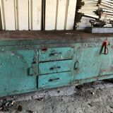 Former industrial workbench in metal