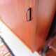 Vintage teak shelving system in 60s-70s style, retro style.
