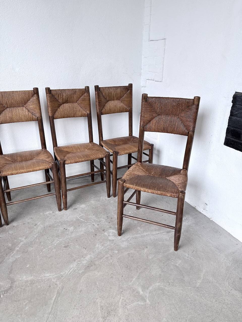 Set of 6 straw and oak Beauche chairs.