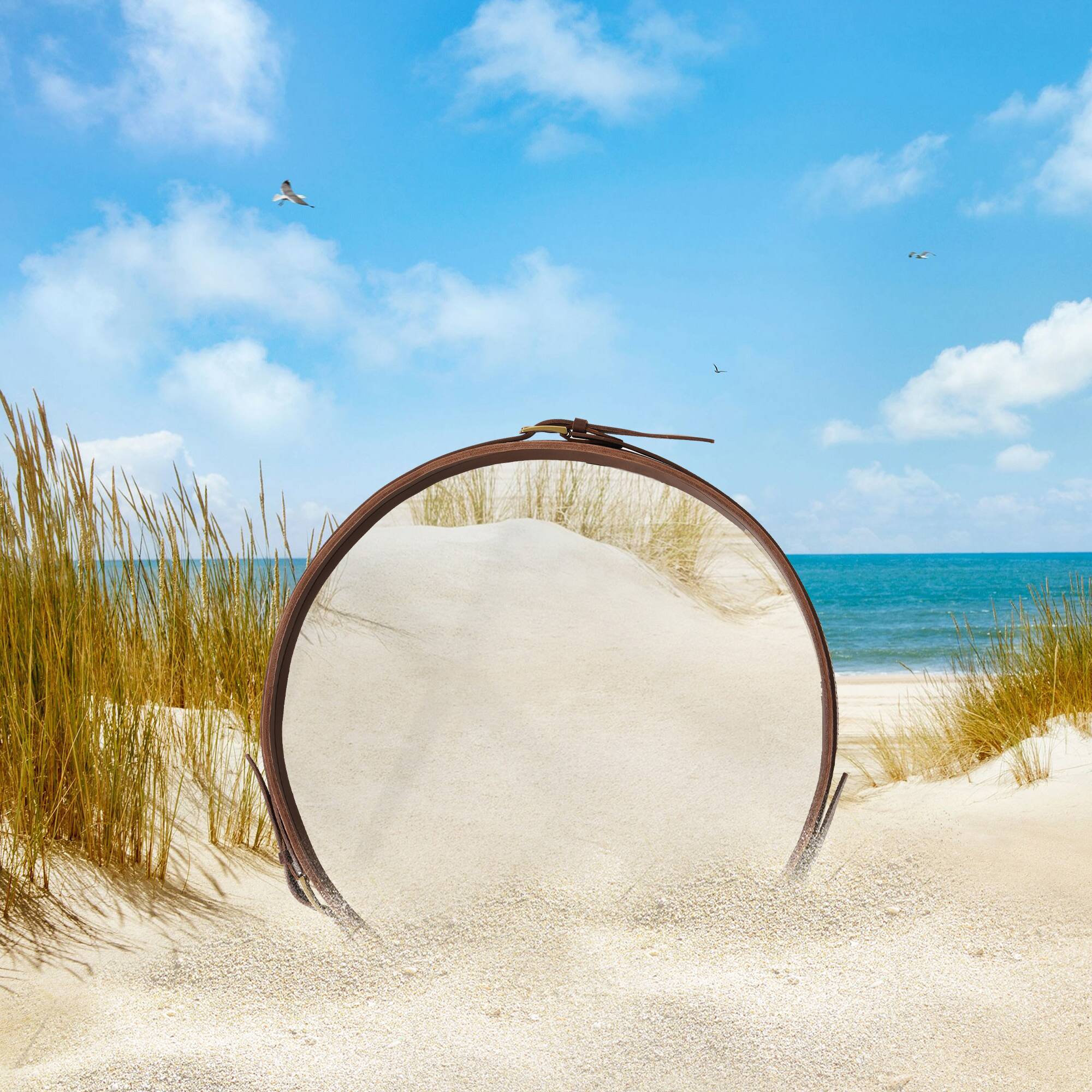 Handmade J. Adnet style mirror in brown vegetable-tanned leather, ø 70 cm