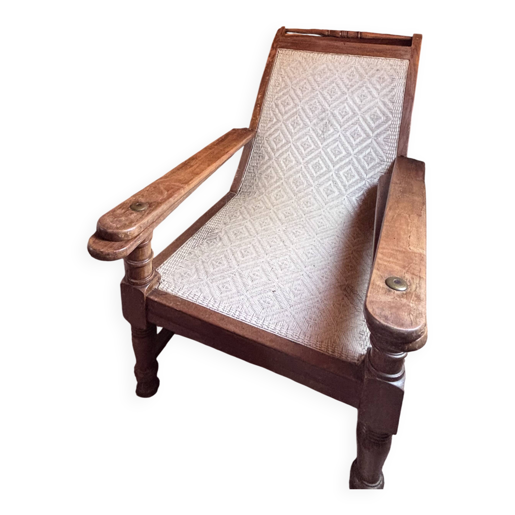 Vintage armchair in solid wood and geometric weaving – lodge spirit