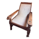 Vintage armchair in solid wood and geometric weaving – lodge spirit