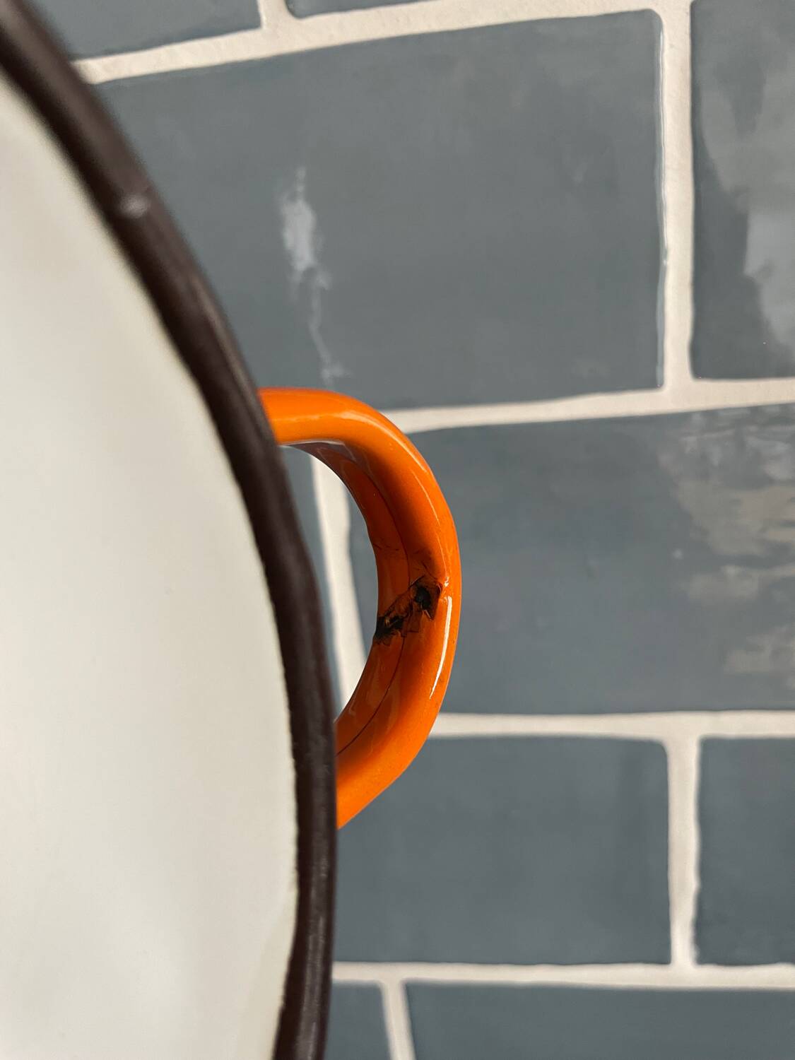 Orange enameled sheet egg dish