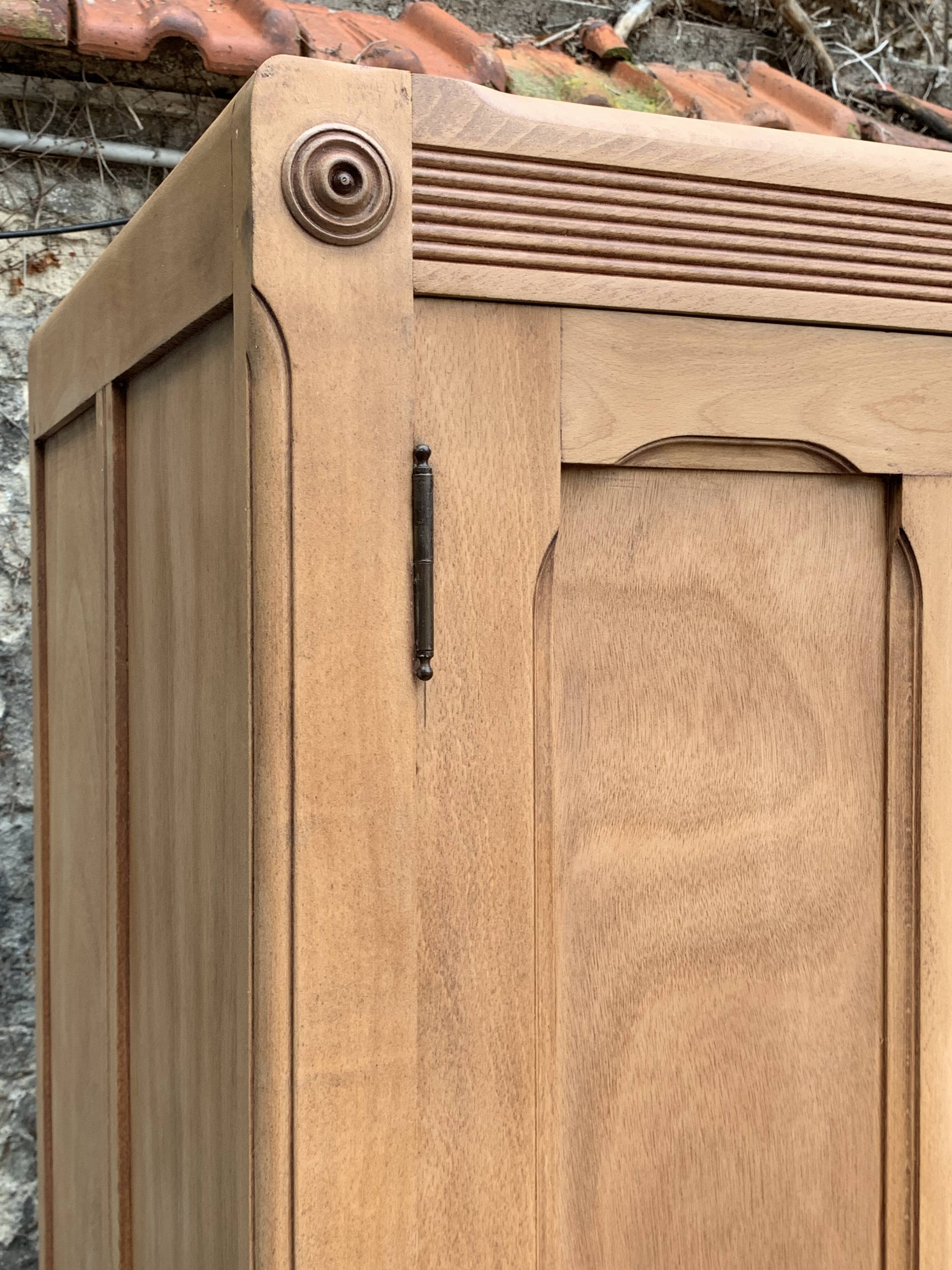 Parisian paneled cabinet in raw wood, 1940