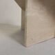 Mid-Century travertine coffee table with a triangular top, 1970s.