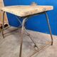 Vintage workbench circa 1930, folding metal leg.