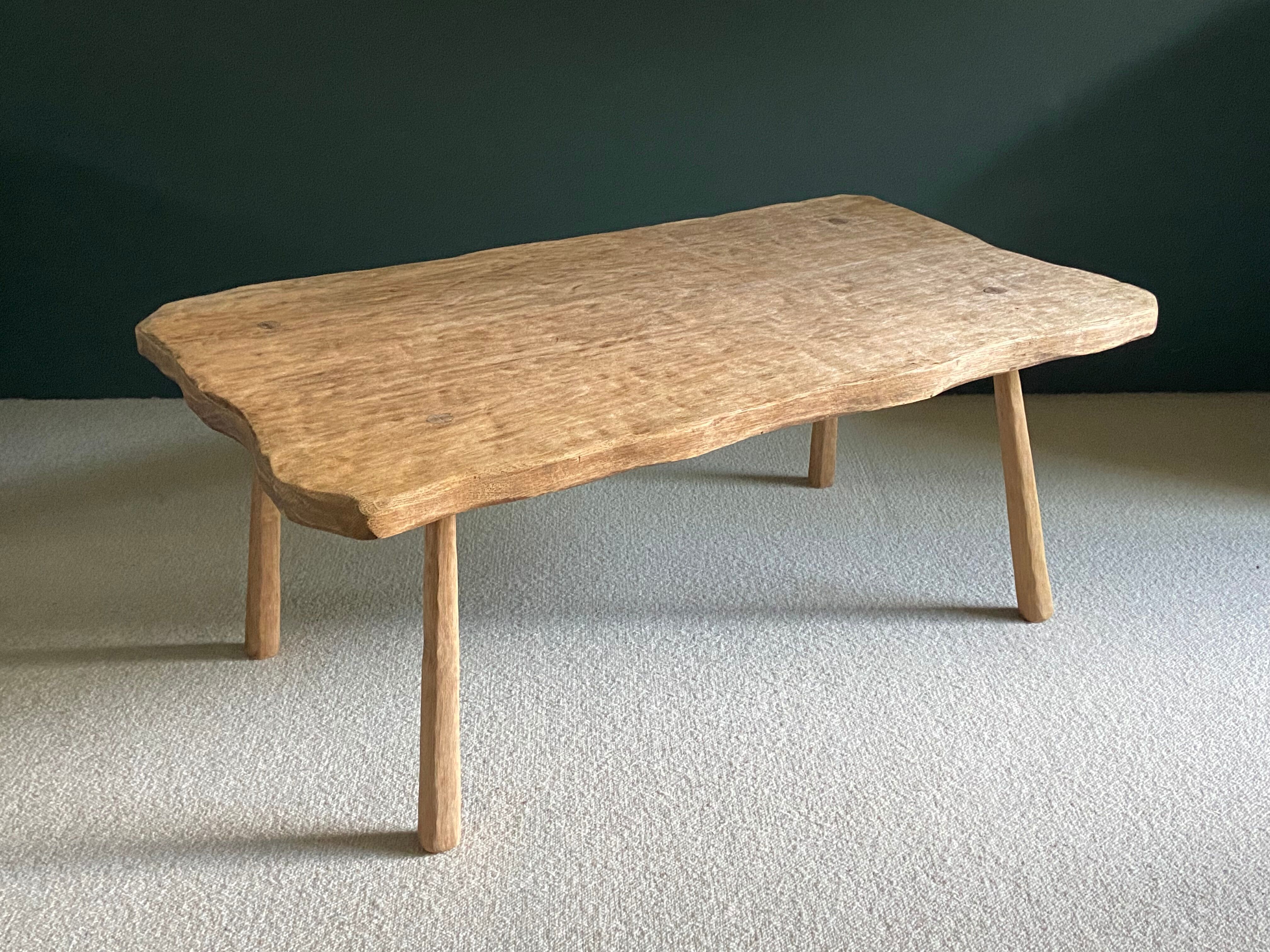 Free-form raw wood coffee table