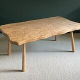 Free-form raw wood coffee table