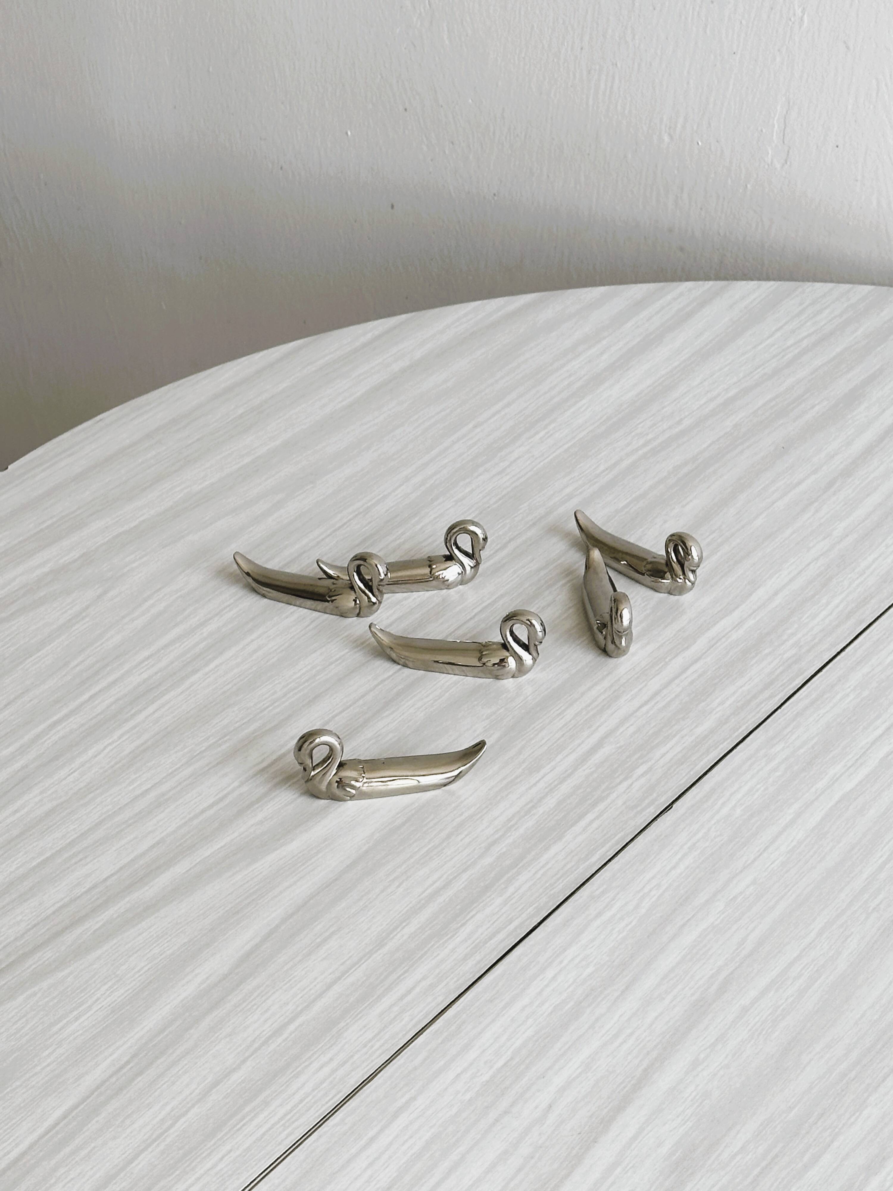 set of 6 silver metal swan-shaped knife holders