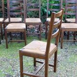 Suite of 17 straw chairs with high backs
