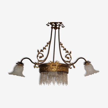 Gold metal chandelier and three-light beads