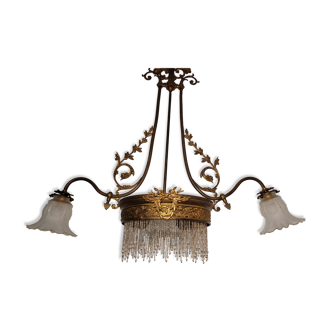 Gold metal chandelier and three-light beads