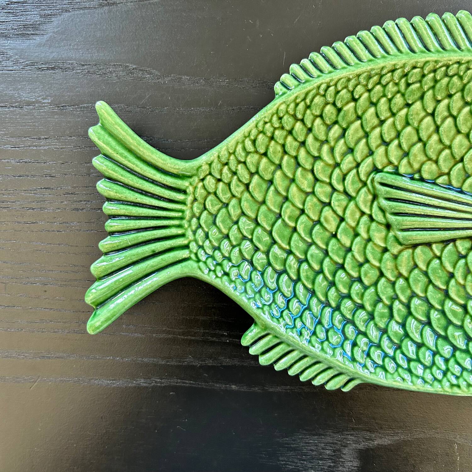 Fish dish in green earthenware