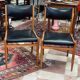 2 Scandinavian-style natural wood chairs, black trim