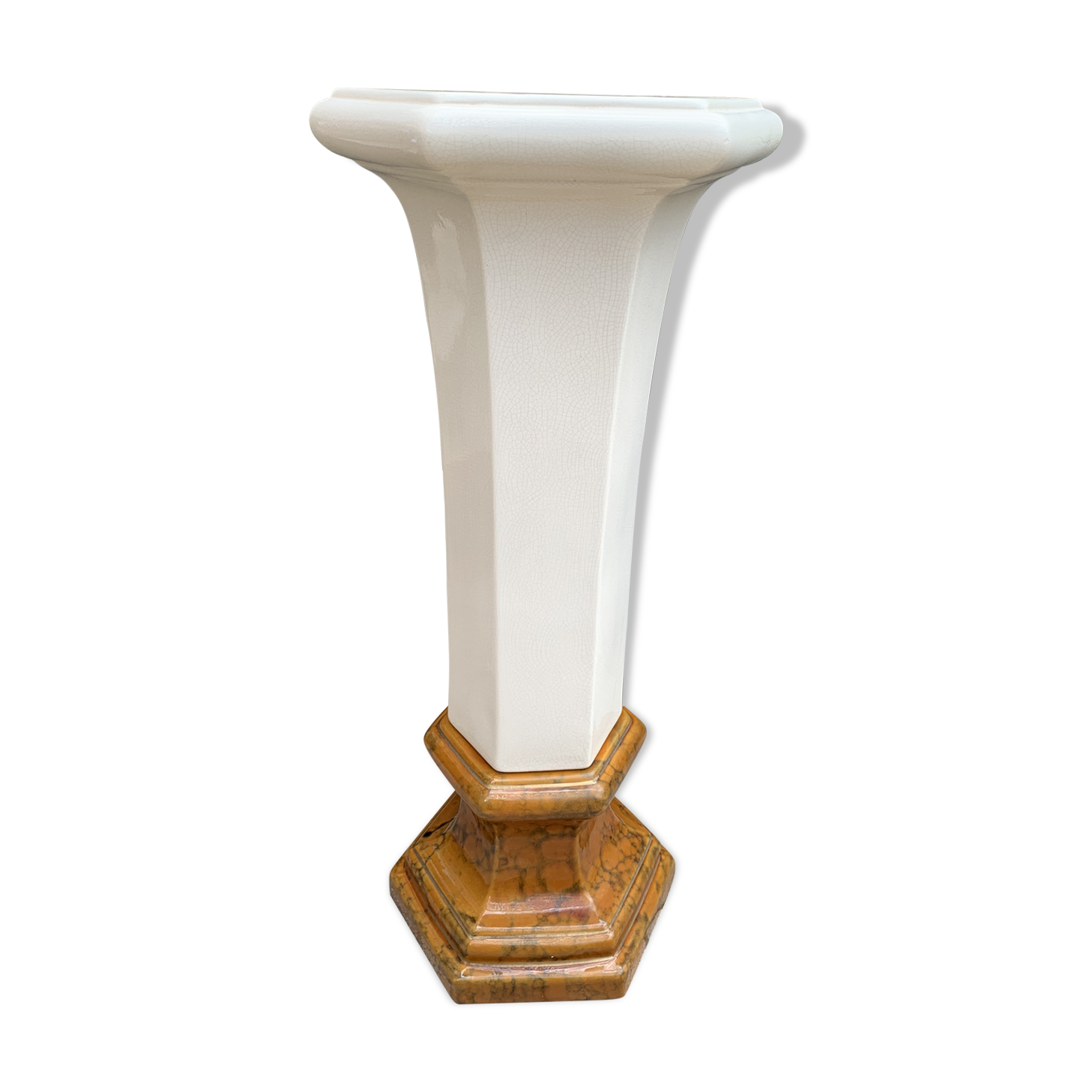 Column wears vintage plant