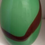 Very thick green glass vase with brown accents, very heavy, perfect condition.