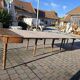 12-foot round oak table with 7 extensions / 20 people