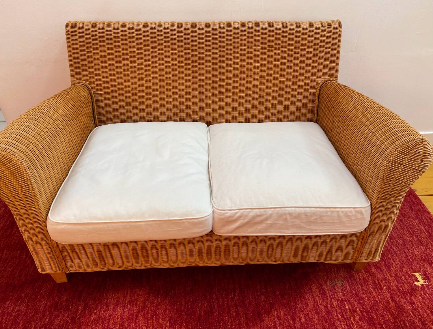 Antique 2-seater rattan sofa from the 70s