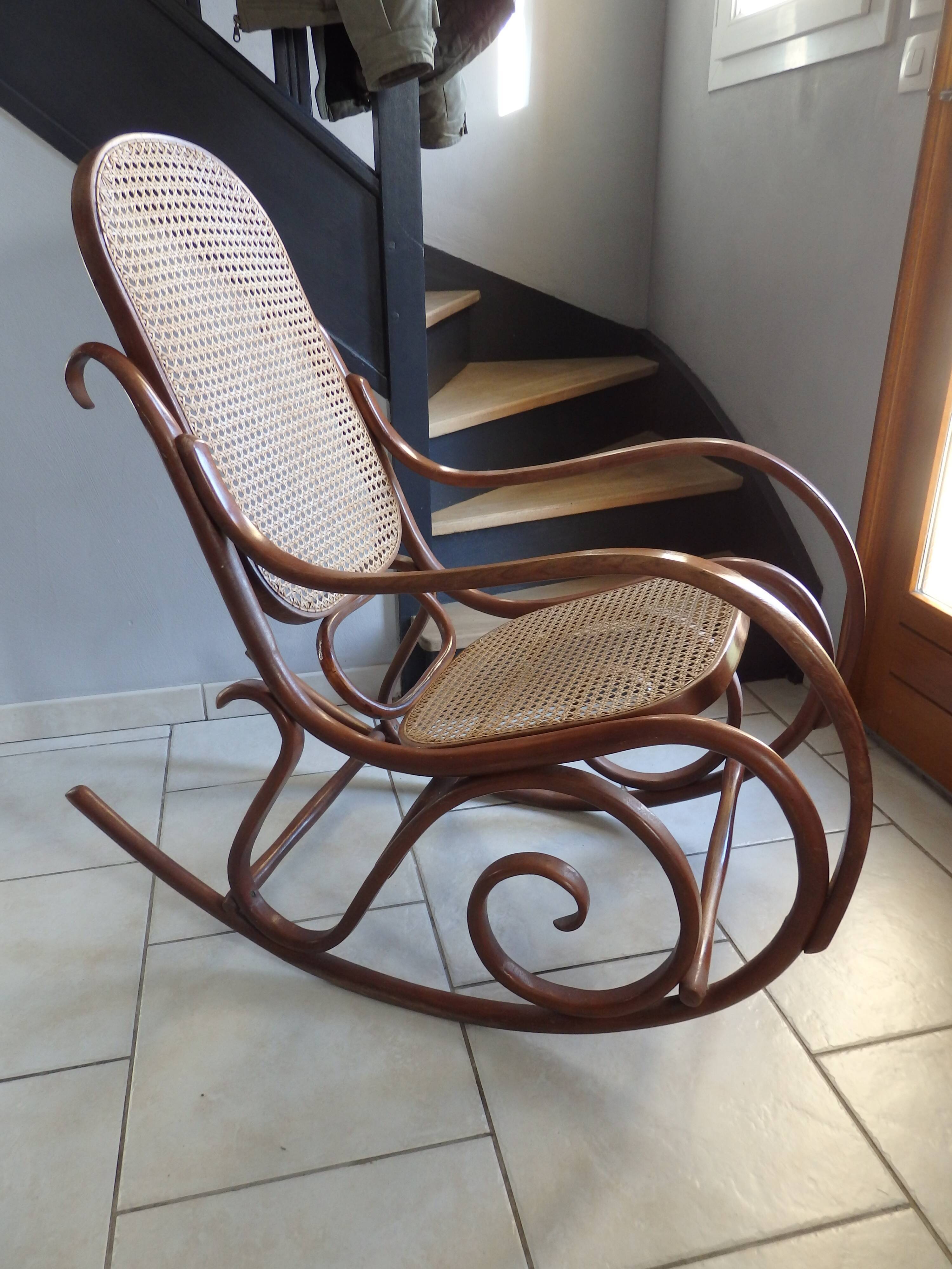 Rocking-chair in turned wood and cannage