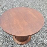Vintage round oak coffee table with a door