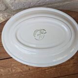 Oval serving dish with hand-painted pink flowers in San Marciano ceramic.