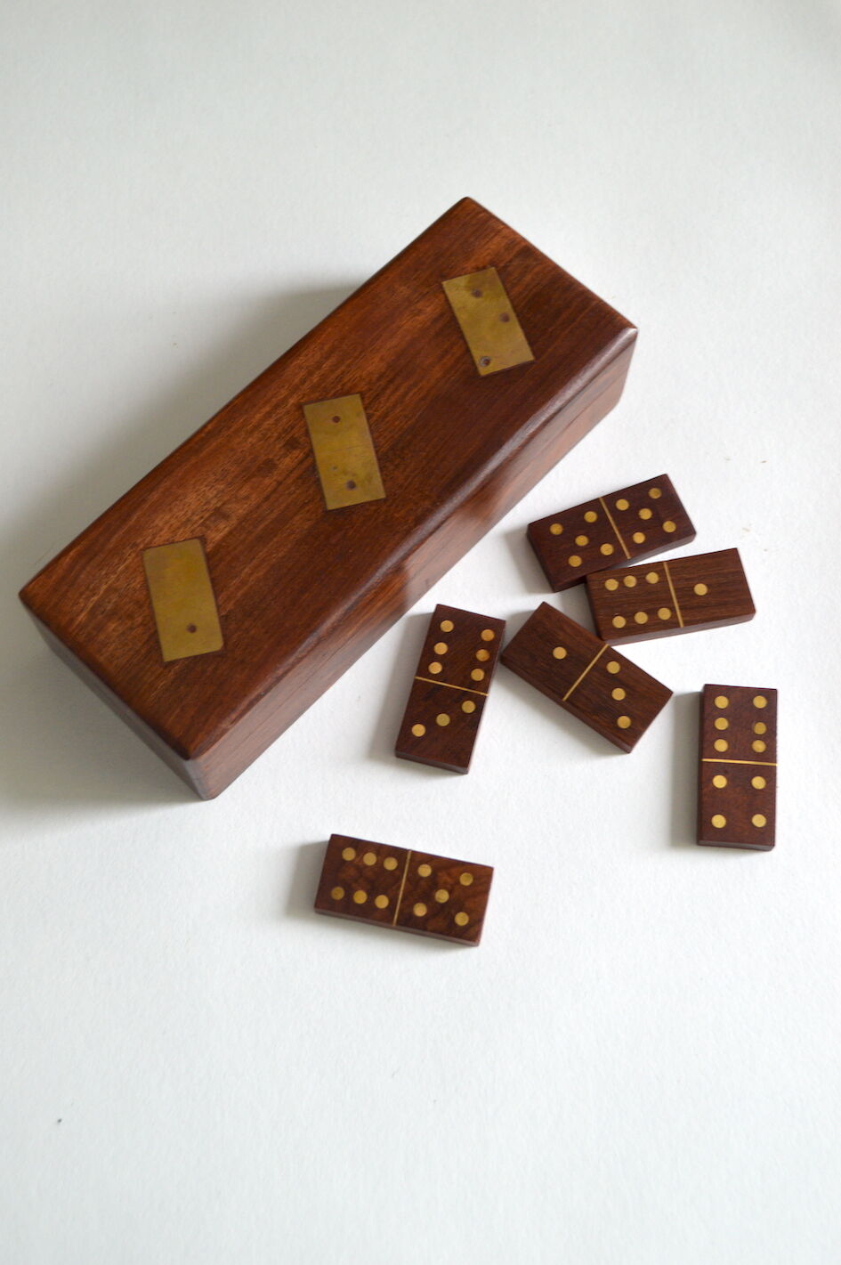 Box of brass and rosewood dominoes
