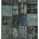 Hand-knotted oriental vintage 170 cm x 241 cm black patchwork rug