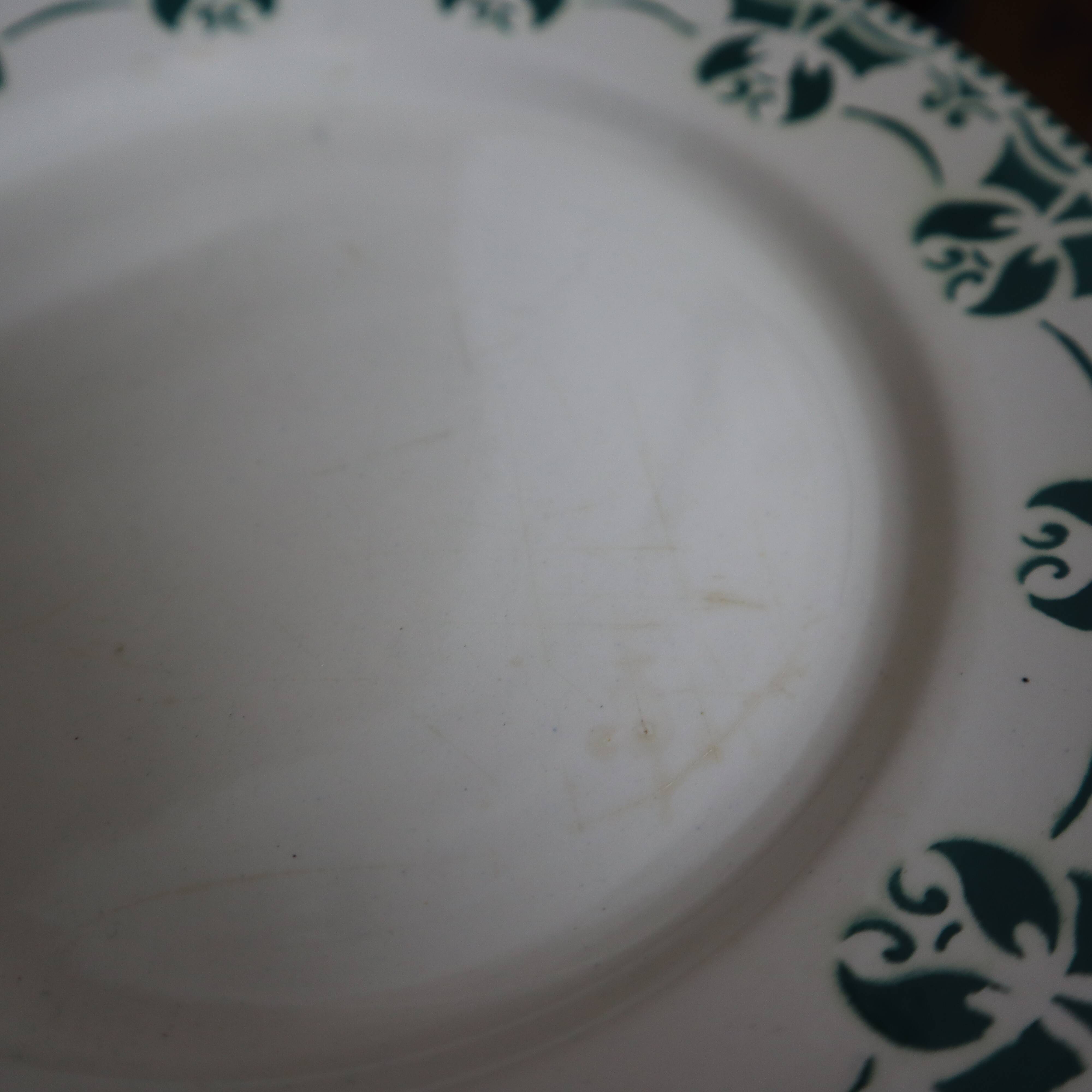 6 flat plates in white and green earthenware Saint Amand Terre de Fer